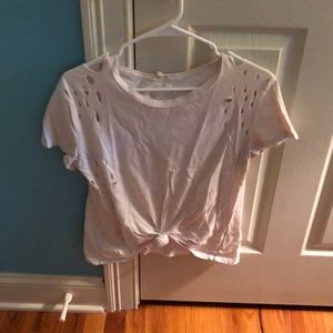 Off white T shirt with purposeful holes